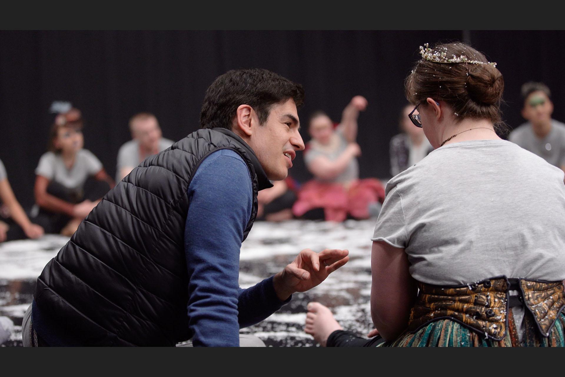 Federico Bonelli explains to an eagerly listening performer exactly what she needs to do in the piece.